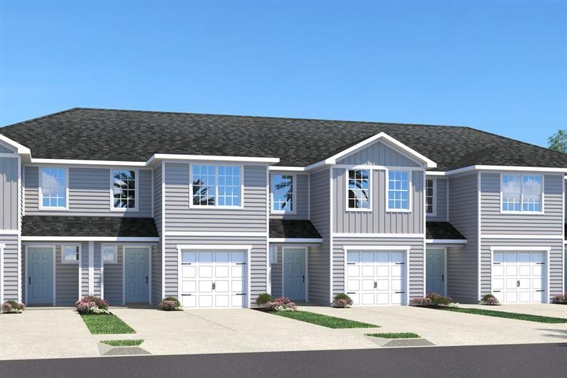Front exterior of a new home in Seminole Palms Townhomes, Palm Coast, FL, highlighting curb appeal (Image 1). Front exterior of a new home in Seminole Palms Townhomes, Palm Coast, FL, highlighting curb appeal (Image 1).