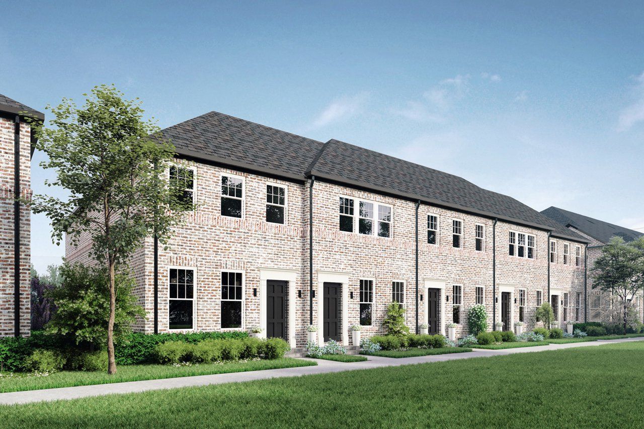 Front exterior of a new home in 1897 Townhomes, Plano, TX, highlighting curb appeal (Image 1).