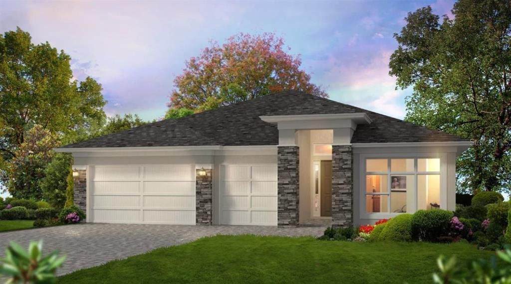 Front exterior of a new home in Plantation Bay, Ormond Beach, FL, highlighting curb appeal (Image 1). Front exterior of a new home in Plantation Bay, Ormond Beach, FL, highlighting curb appeal (Image 1).