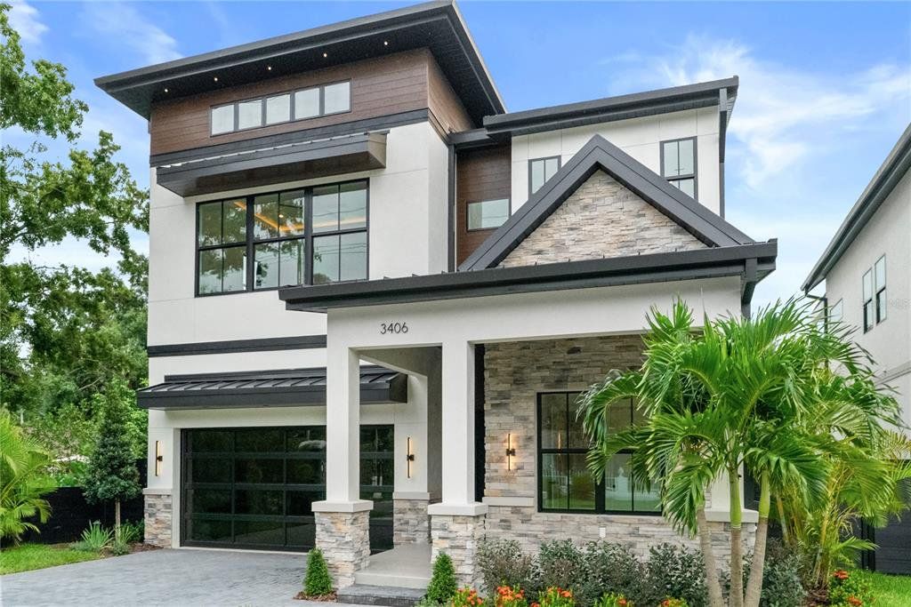 Front exterior of a new home in , Tampa, FL, highlighting curb appeal (Image 1). Front exterior of a new home in , Tampa, FL, highlighting curb appeal (Image 1).