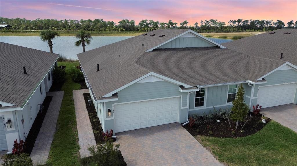 Front exterior of a new home in , Punta Gorda, FL, highlighting curb appeal (Image 1). Front exterior of a new home in , Punta Gorda, FL, highlighting curb appeal (Image 1).