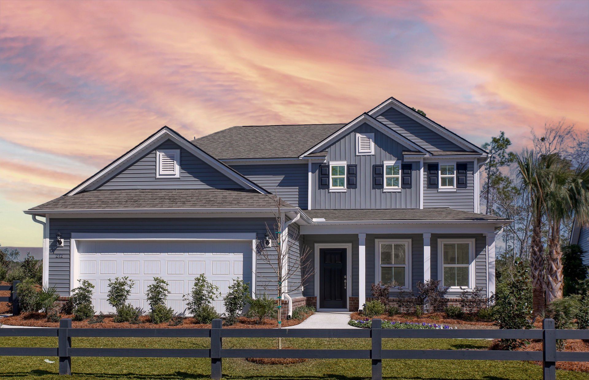 Front exterior of a new home in Waterways, Richmond Hill, GA, highlighting curb appeal (Image 1). Front exterior of a new home in Waterways, Richmond Hill, GA, highlighting curb appeal (Image 1).