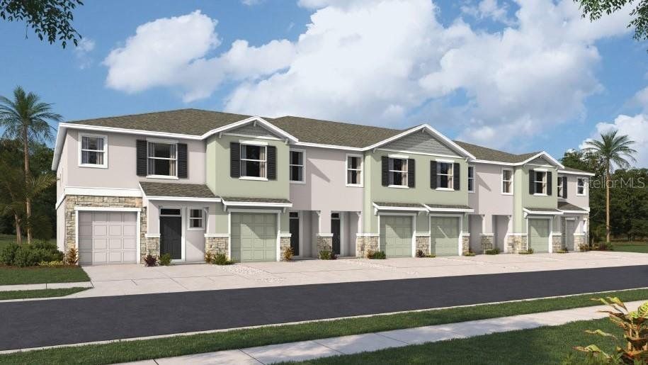 Front exterior of a new home in Angeline, Land O' Lakes, FL, highlighting curb appeal (Image 1). Front exterior of a new home in Angeline, Land O' Lakes, FL, highlighting curb appeal (Image 1).