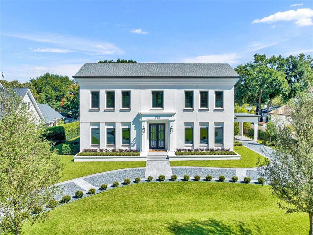 Front exterior of a new home in , Winter Park, FL, highlighting curb appeal (Image 1). Front exterior of a new home in , Winter Park, FL, highlighting curb appeal (Image 1).