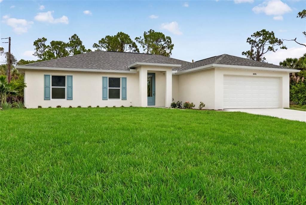 Front exterior of a new home in , Port Charlotte, FL, highlighting curb appeal (Image 1). Front exterior of a new home in , Port Charlotte, FL, highlighting curb appeal (Image 1).