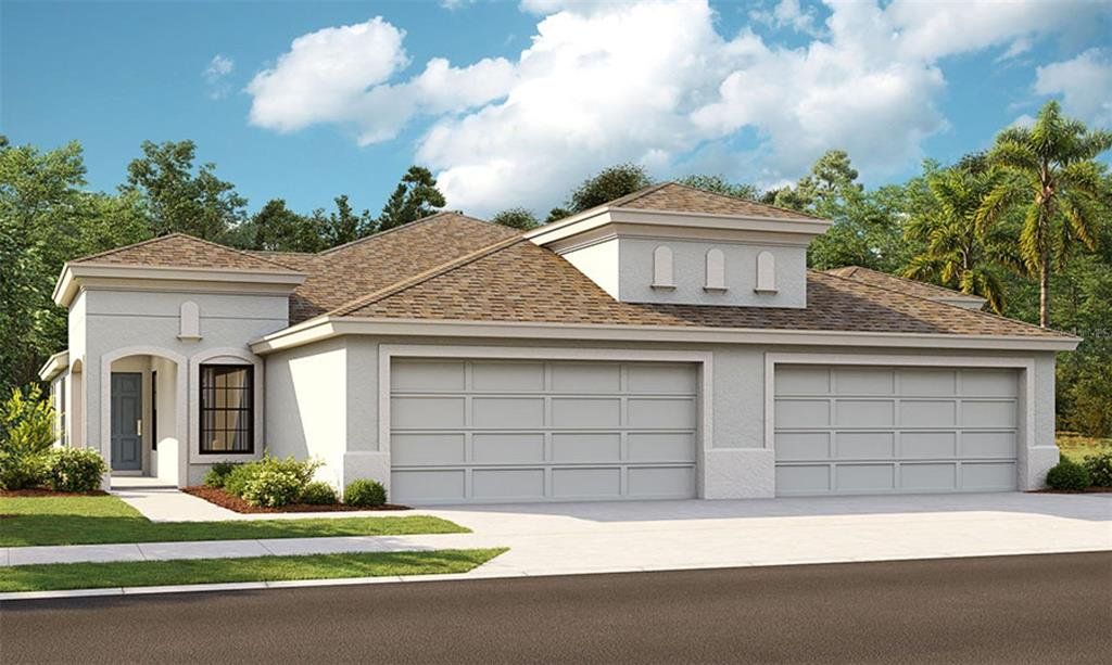 Front exterior of a new home in Crosswind Point, Parrish, FL, highlighting curb appeal (Image 1). Front exterior of a new home in Crosswind Point, Parrish, FL, highlighting curb appeal (Image 1).