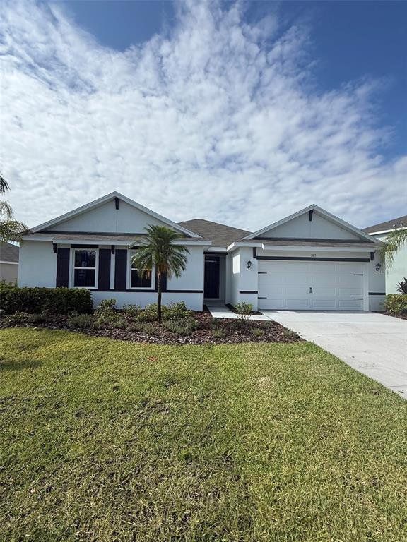Front exterior of a new home in Silverstone North, Palmetto, FL, highlighting curb appeal (Image 1). Front exterior of a new home in Silverstone North, Palmetto, FL, highlighting curb appeal (Image 1).