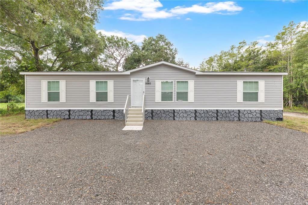 Front exterior of a new home in , St. Cloud, FL, highlighting curb appeal (Image 1). Front exterior of a new home in , St. Cloud, FL, highlighting curb appeal (Image 1).