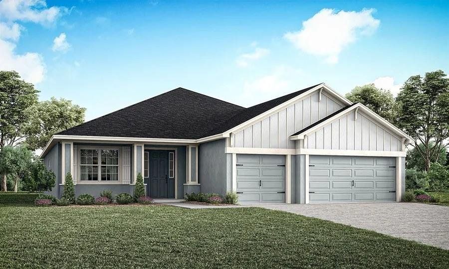 Front exterior of a new home in Gardens at Lancaster Park, St. Cloud, FL, highlighting curb appeal (Image 1).