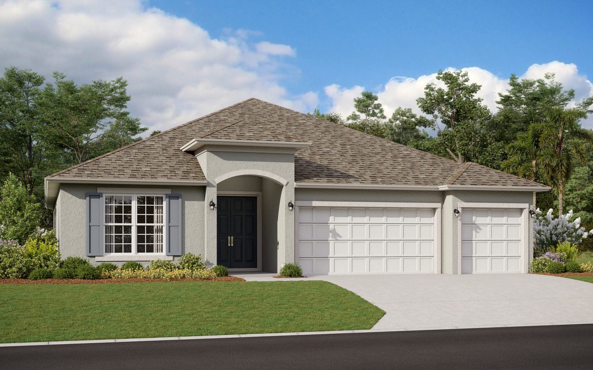 Front exterior of a new home in Hills of Minneola, Minneola, FL, highlighting curb appeal (Image 1).