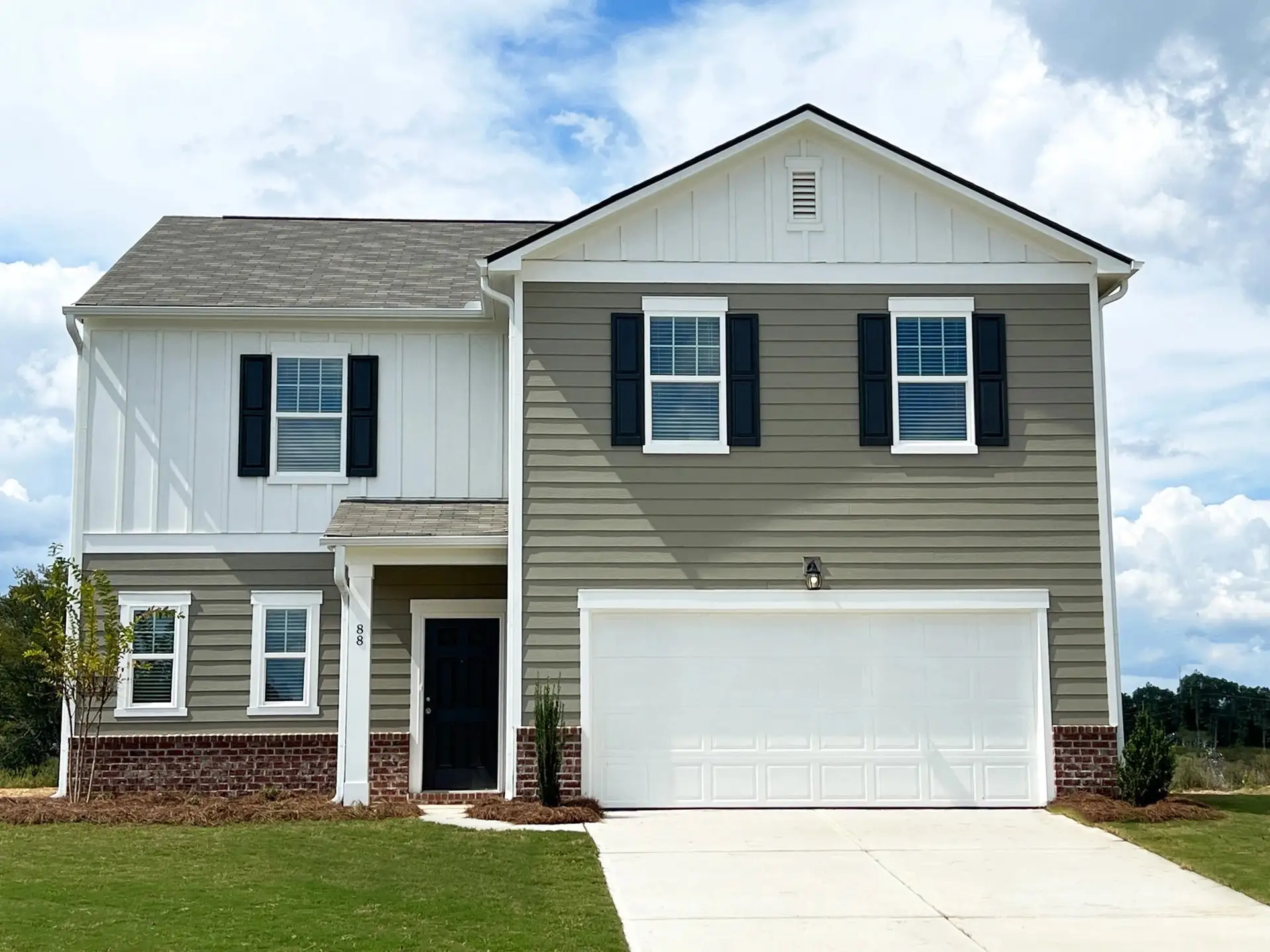 Front exterior of a new home in Casteel, Bethlehem, GA, highlighting curb appeal (Image 1). Front exterior of a new home in Casteel, Bethlehem, GA, highlighting curb appeal (Image 1).