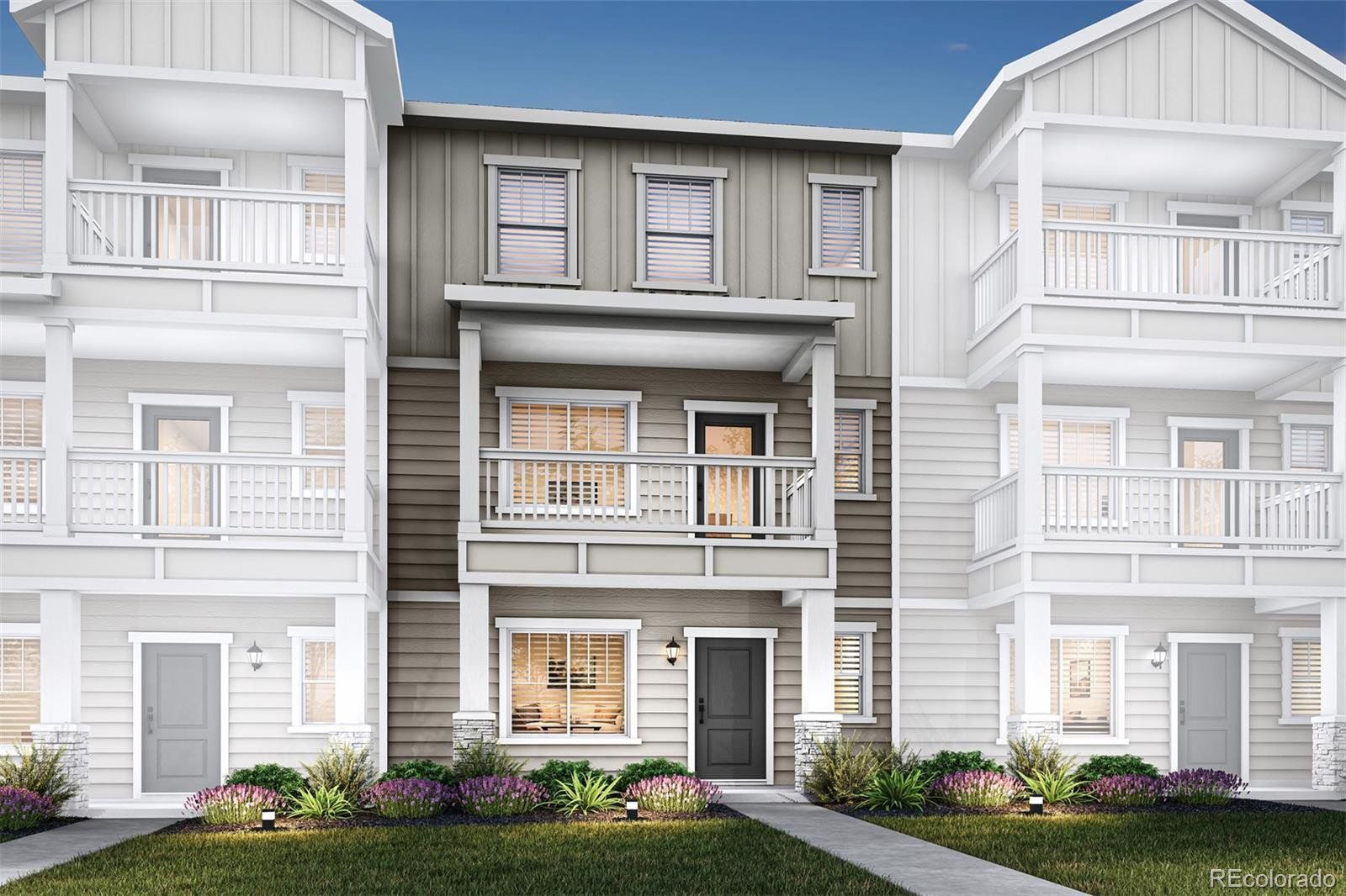 Front exterior of a new home in Evergreen Ridge, Colorado Springs, CO, highlighting curb appeal (Image 1). Front exterior of a new home in Evergreen Ridge, Colorado Springs, CO, highlighting curb appeal (Image 1).