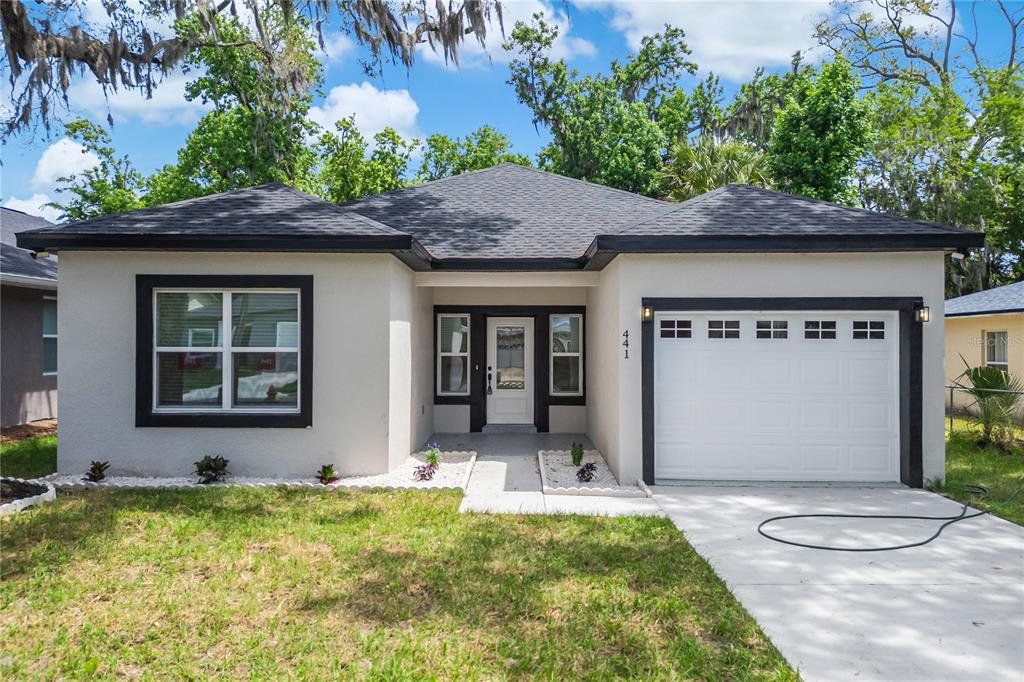 Front exterior of a new home in , Daytona Beach, FL, highlighting curb appeal (Image 1). Front exterior of a new home in , Daytona Beach, FL, highlighting curb appeal (Image 1).