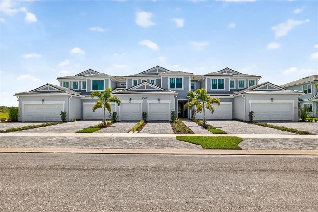 Front exterior of a new home in Wellen Park, Venice, FL, highlighting curb appeal (Image 1). Front exterior of a new home in Wellen Park, Venice, FL, highlighting curb appeal (Image 1).