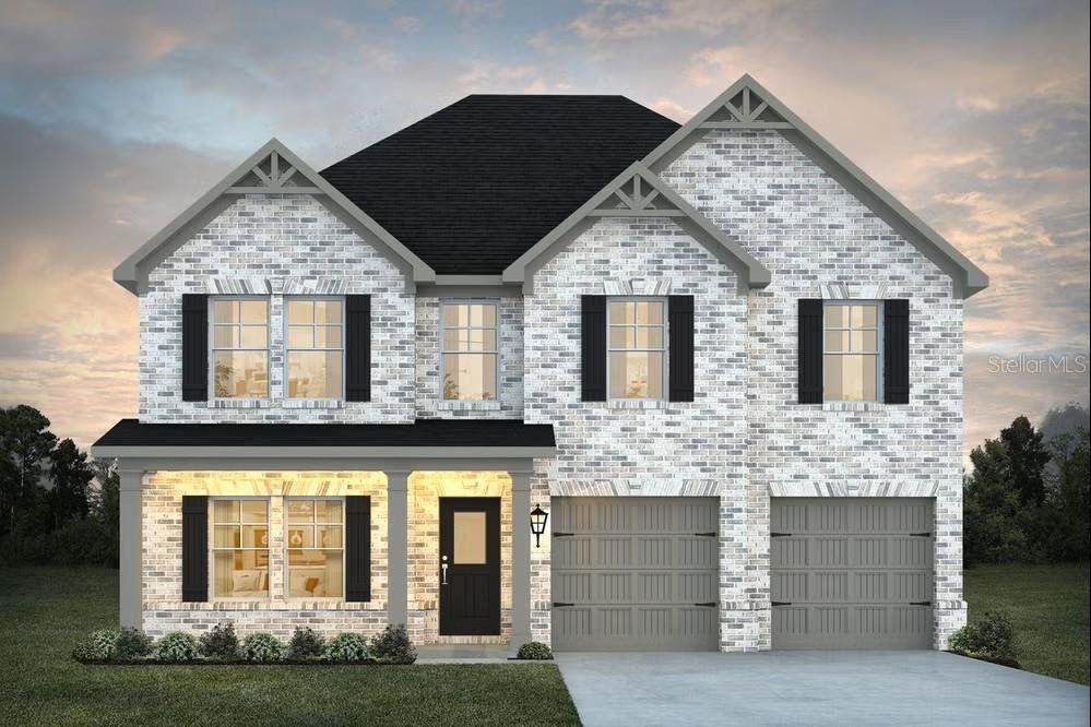 Front exterior of a new home in Creekbend Overlook, South Fulton, GA, highlighting curb appeal (Image 1). Front exterior of a new home in Creekbend Overlook, South Fulton, GA, highlighting curb appeal (Image 1).