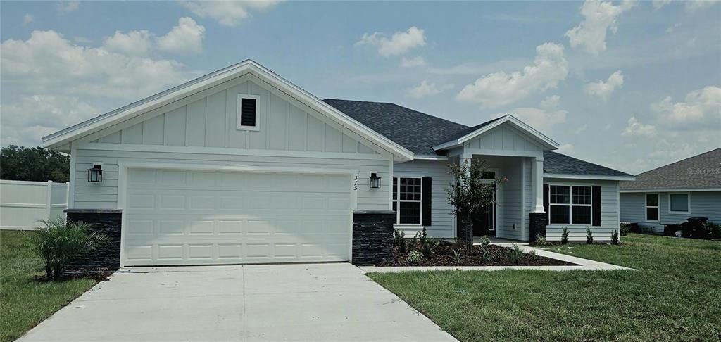 Front exterior of a new home in The Preserve at Laurel Lake, Lake City, FL, highlighting curb appeal (Image 1). Front exterior of a new home in The Preserve at Laurel Lake, Lake City, FL, highlighting curb appeal (Image 1).
