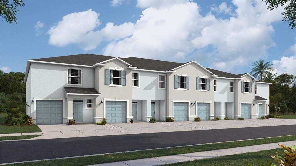 Front exterior of a new home in Oasis at Longwood Run, Sarasota, FL, highlighting curb appeal (Image 1). Front exterior of a new home in Oasis at Longwood Run, Sarasota, FL, highlighting curb appeal (Image 1).