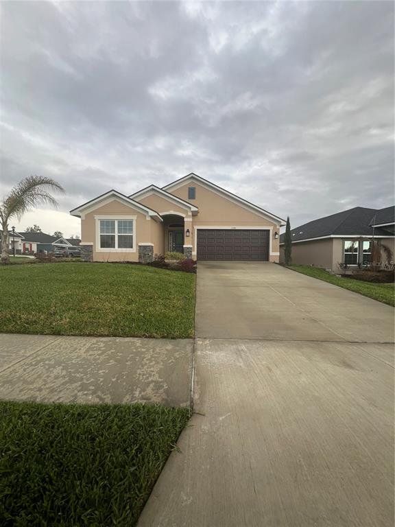 Front exterior of a new home in Abbey Glen, Dade City, FL, highlighting curb appeal (Image 1). Front exterior of a new home in Abbey Glen, Dade City, FL, highlighting curb appeal (Image 1).