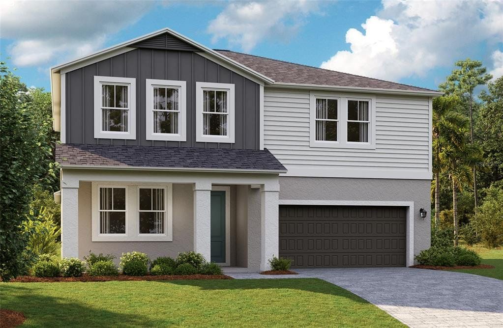 Front exterior of a new home in Pasadena Woods, Wesley Chapel, FL, highlighting curb appeal (Image 1). Front exterior of a new home in Pasadena Woods, Wesley Chapel, FL, highlighting curb appeal (Image 1).