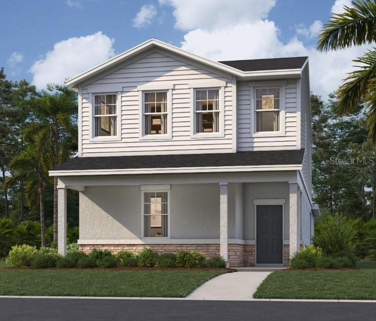 Front exterior of a new home in Brack Ranch, St. Cloud, FL, highlighting curb appeal (Image 1). Front exterior of a new home in Brack Ranch, St. Cloud, FL, highlighting curb appeal (Image 1).