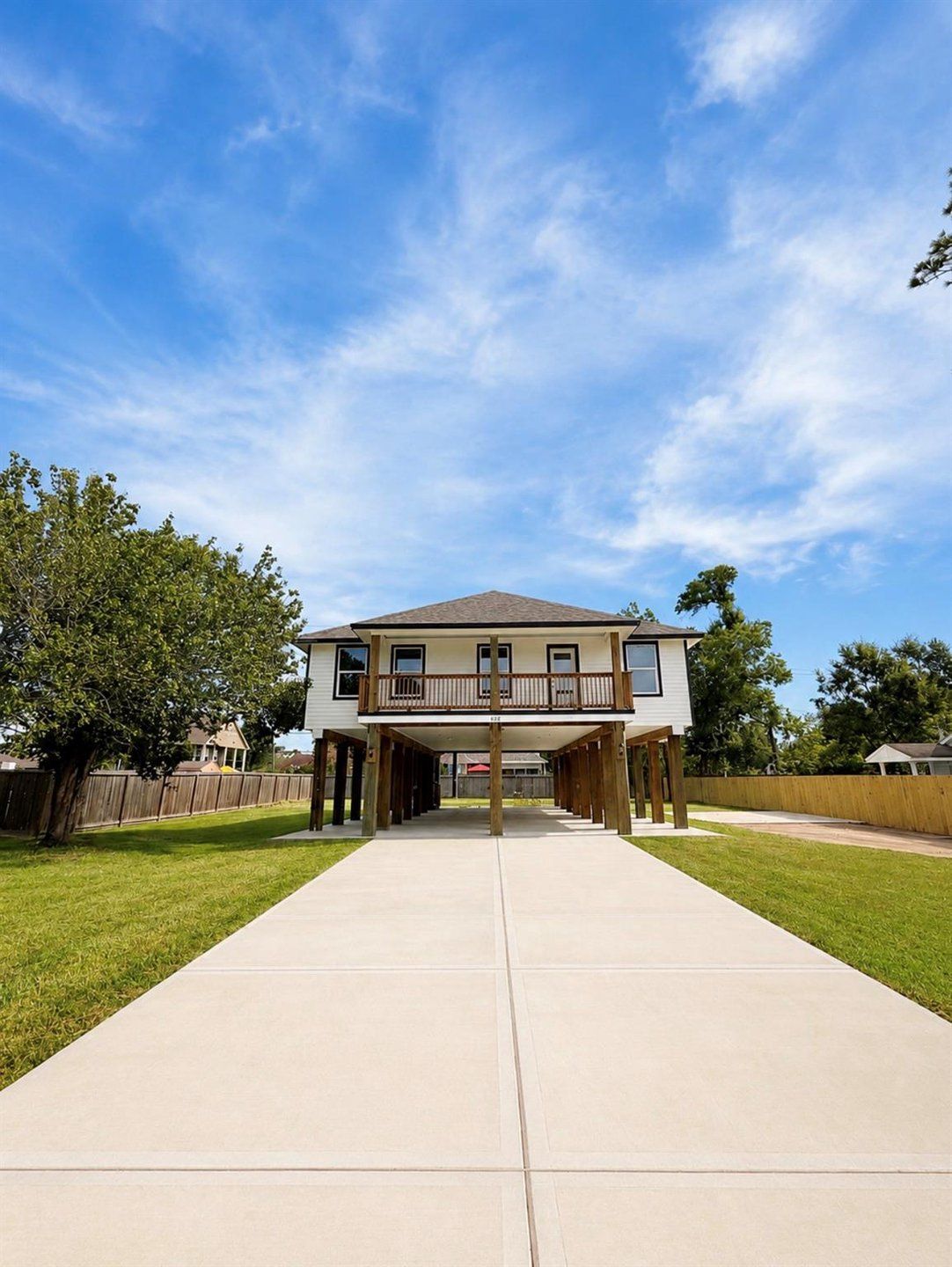 Front exterior of a new home in , Shoreacres, TX, highlighting curb appeal (Image 1). Front exterior of a new home in , Shoreacres, TX, highlighting curb appeal (Image 1).