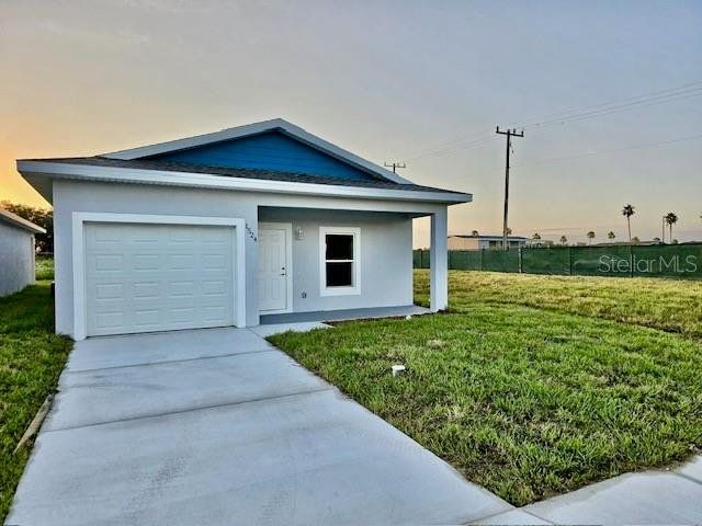 Front exterior of a new home in , Sebring, FL, highlighting curb appeal (Image 1). Front exterior of a new home in , Sebring, FL, highlighting curb appeal (Image 1).