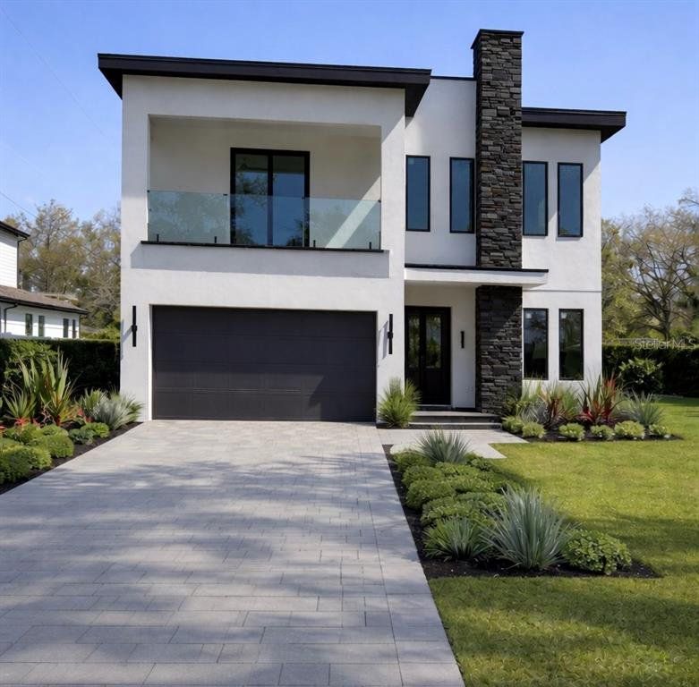 Front exterior of a new home in , Tampa, FL, highlighting curb appeal (Image 1). Front exterior of a new home in , Tampa, FL, highlighting curb appeal (Image 1).