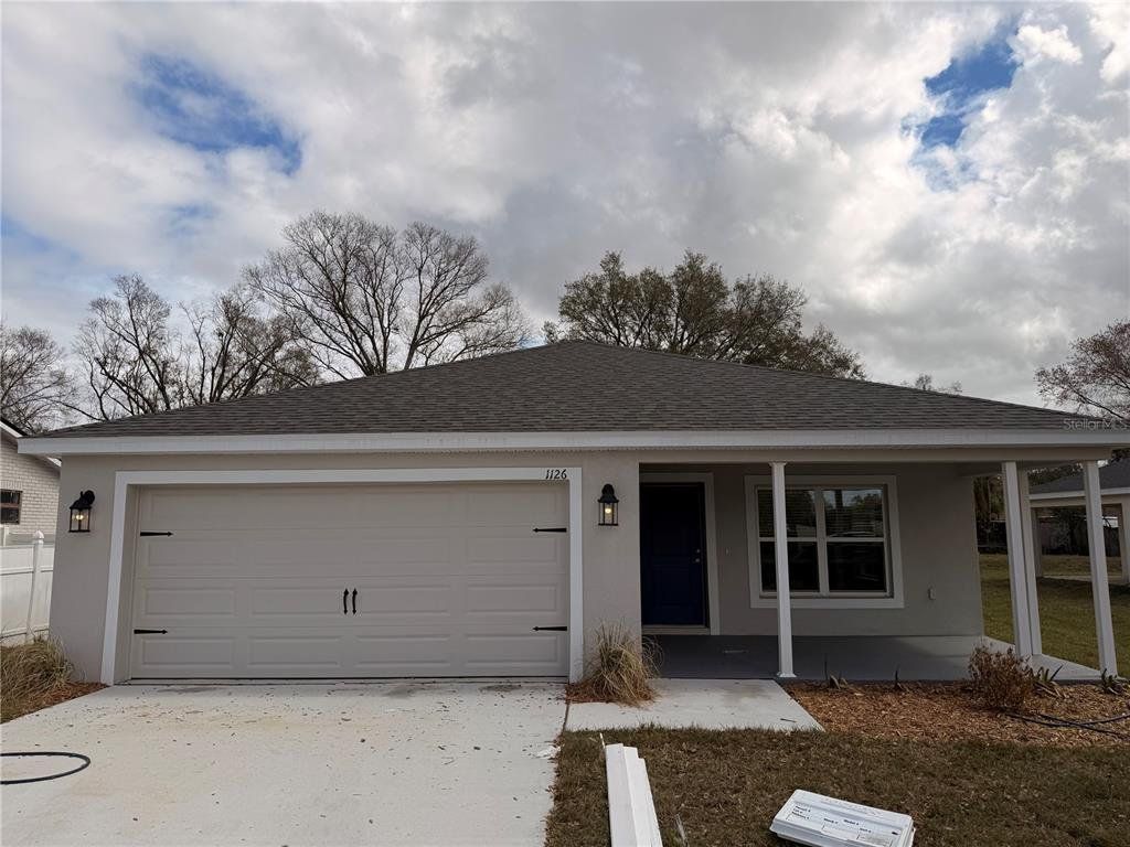 Front exterior of a new home in , Lakeland, FL, highlighting curb appeal (Image 1). Front exterior of a new home in , Lakeland, FL, highlighting curb appeal (Image 1).