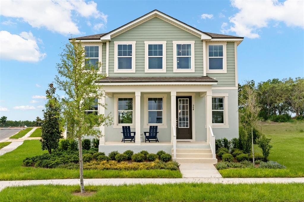 Front exterior of a new home in Rainwood, Groveland, FL, highlighting curb appeal (Image 1). Front exterior of a new home in Rainwood, Groveland, FL, highlighting curb appeal (Image 1).