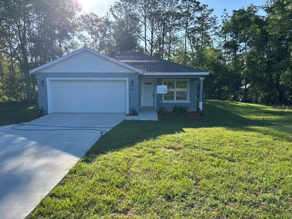 Front exterior of a new home in , Dunnellon, FL, highlighting curb appeal (Image 1). Front exterior of a new home in , Dunnellon, FL, highlighting curb appeal (Image 1).