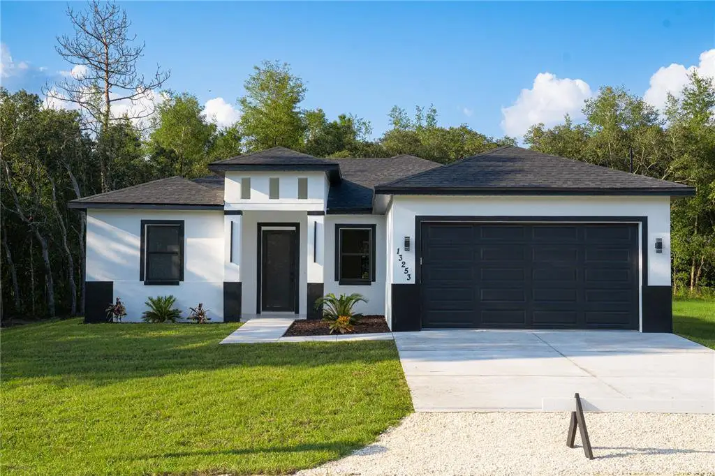 Front exterior of a new home in , Brooksville, FL, highlighting curb appeal (Image 1). Front exterior of a new home in , Brooksville, FL, highlighting curb appeal (Image 1).