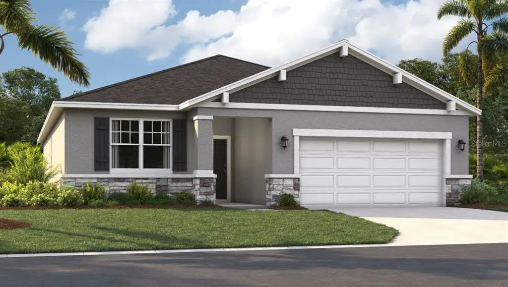 Front exterior of a new home in Silver Lake Pointe, Leesburg, FL, highlighting curb appeal (Image 1). Front exterior of a new home in Silver Lake Pointe, Leesburg, FL, highlighting curb appeal (Image 1).