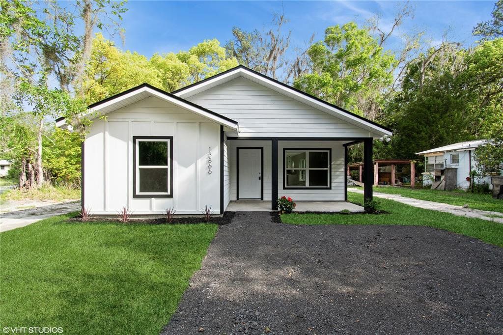 Front exterior of a new home in , Waldo, FL, highlighting curb appeal (Image 1). Front exterior of a new home in , Waldo, FL, highlighting curb appeal (Image 1).