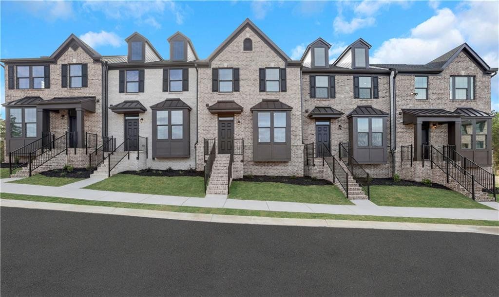 Front exterior of a new home in , Lawrenceville, GA, highlighting curb appeal (Image 1). Front exterior of a new home in , Lawrenceville, GA, highlighting curb appeal (Image 1).