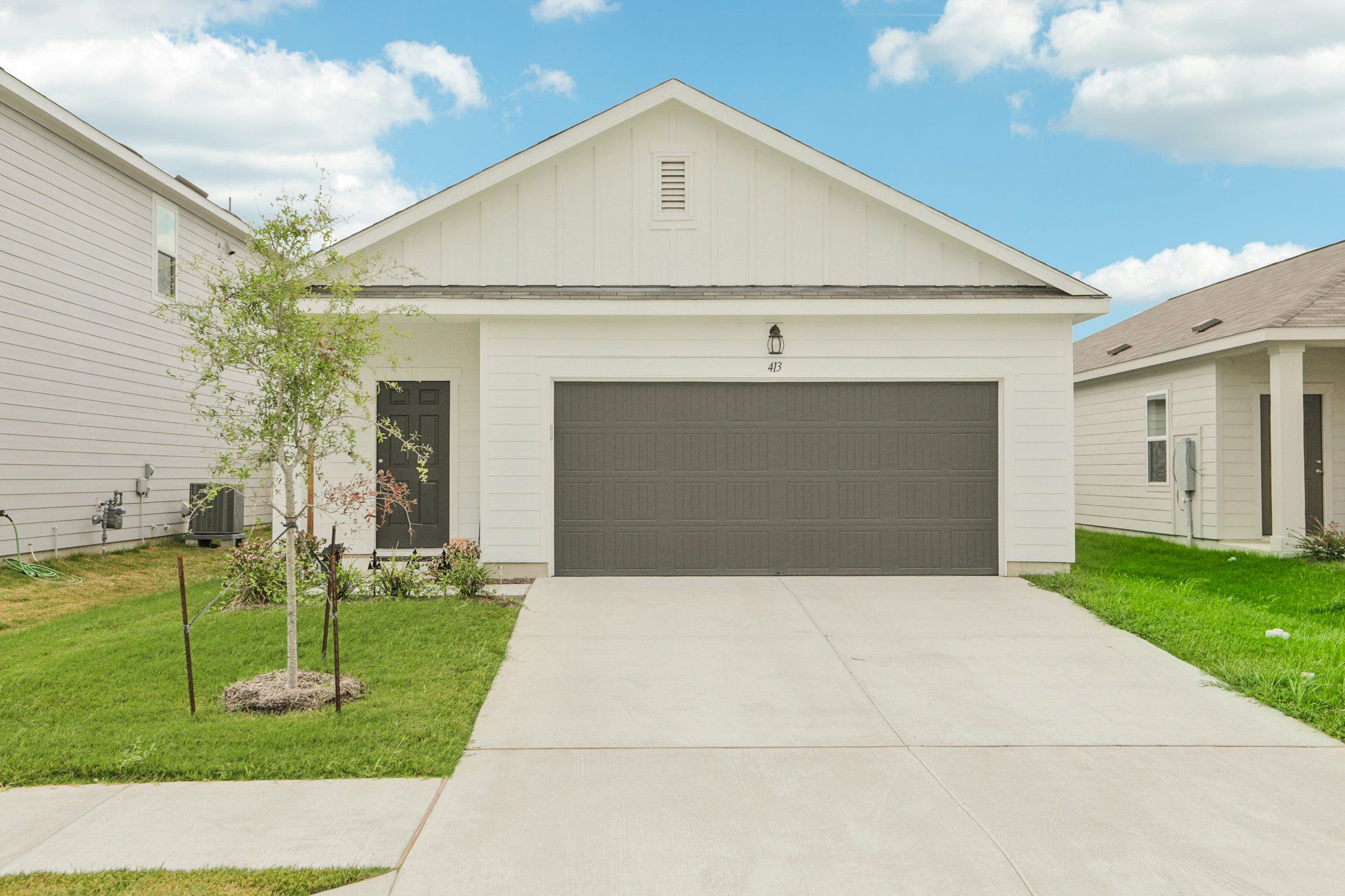 Front exterior of a new home in Hymeadow, Maxwell, TX, highlighting curb appeal (Image 1).
