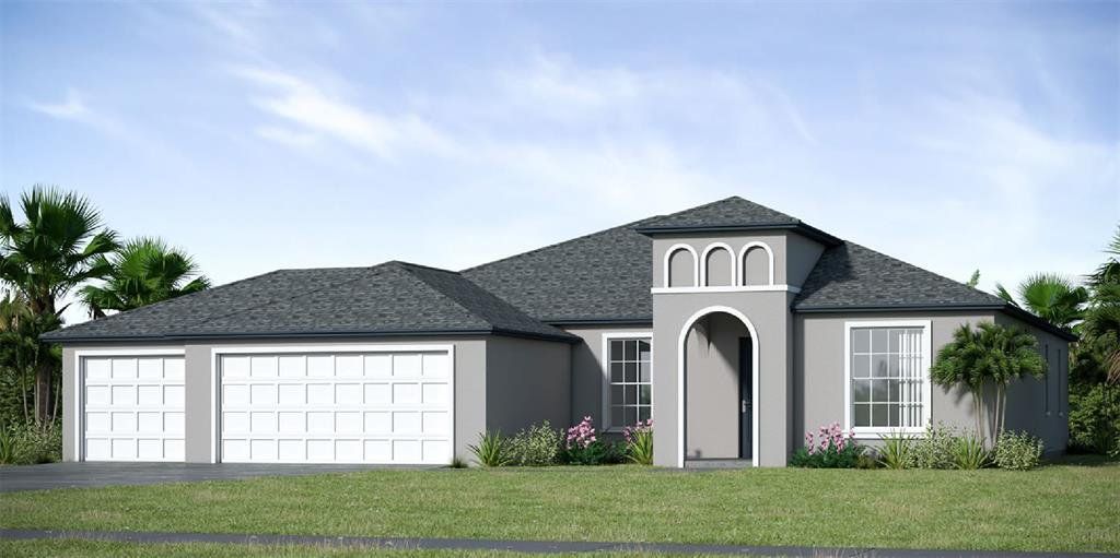 Front exterior of a new home in , Palm Coast, FL, highlighting curb appeal (Image 1). Front exterior of a new home in , Palm Coast, FL, highlighting curb appeal (Image 1).