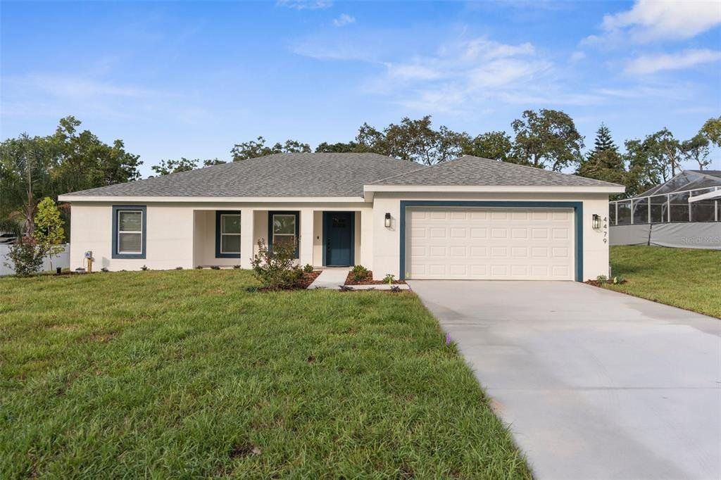 Front exterior of a new home in , Spring Hill, FL, highlighting curb appeal (Image 1). Front exterior of a new home in , Spring Hill, FL, highlighting curb appeal (Image 1).