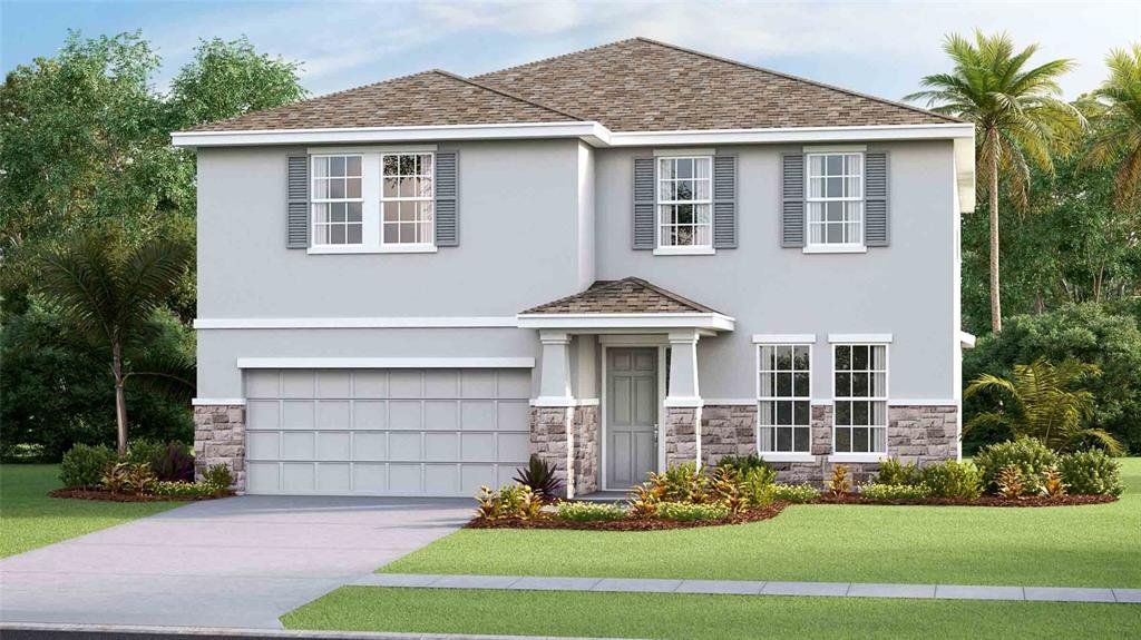 Front exterior of a new home in Ridge at Heath Brook, Ocala, FL, highlighting curb appeal (Image 1). Front exterior of a new home in Ridge at Heath Brook, Ocala, FL, highlighting curb appeal (Image 1).