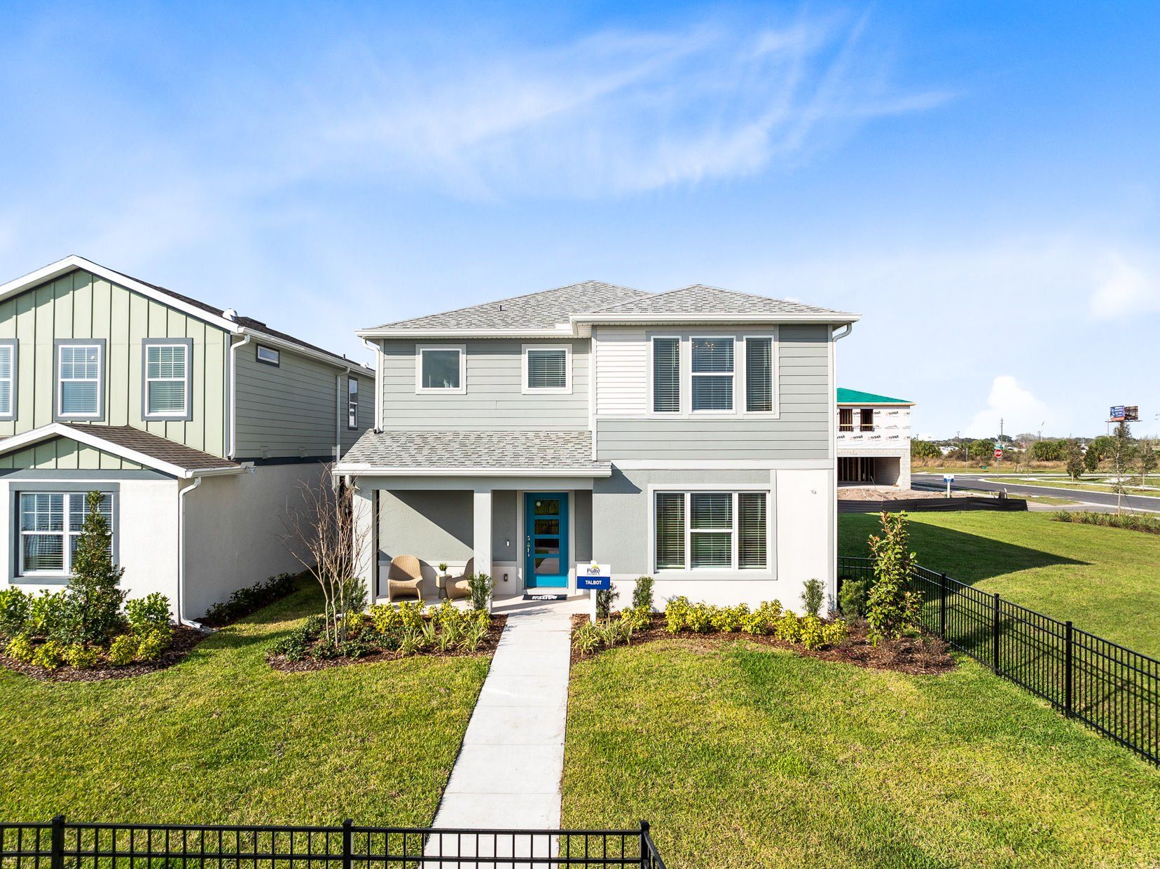 Front exterior of a new home in The Landings at Live Oak Lake, St. Cloud, FL, highlighting curb appeal (Image 1). Front exterior of a new home in The Landings at Live Oak Lake, St. Cloud, FL, highlighting curb appeal (Image 1).