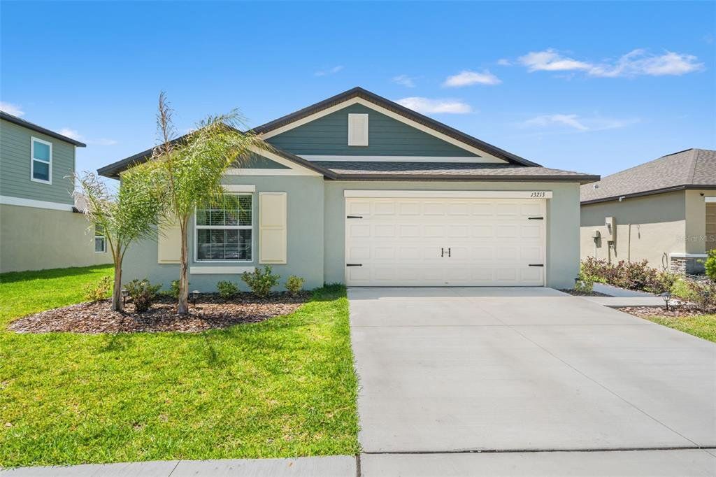 Front exterior of a new home in , Riverview, FL, highlighting curb appeal (Image 1). Front exterior of a new home in , Riverview, FL, highlighting curb appeal (Image 1).