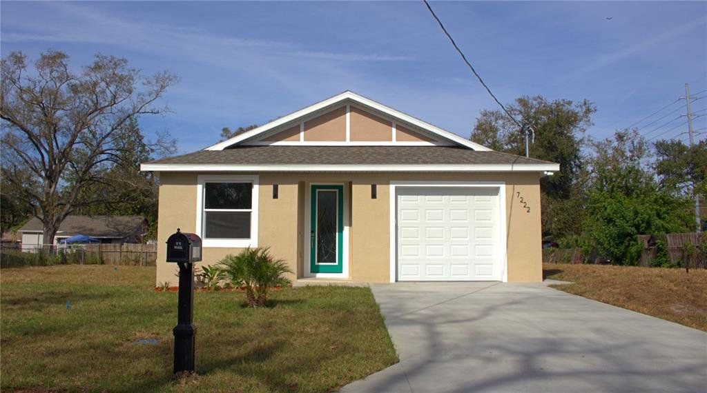 Front exterior of a new home in , Tampa, FL, highlighting curb appeal (Image 1). Front exterior of a new home in , Tampa, FL, highlighting curb appeal (Image 1).