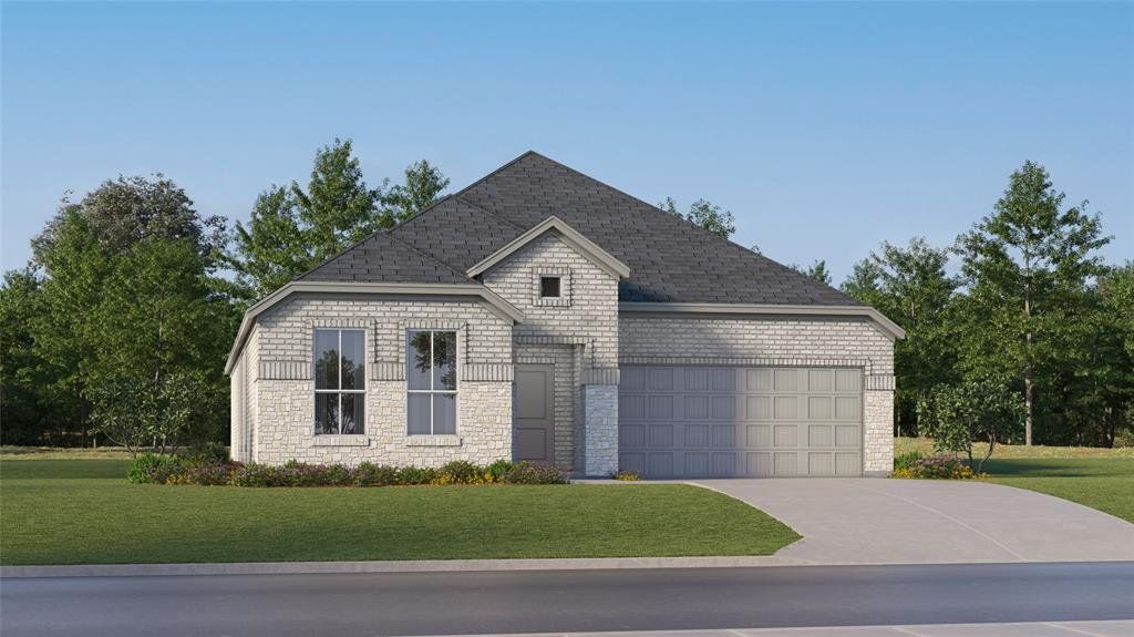 View of front facade featuring stone siding, a front lawn, concrete driveway, brick siding, and roof with shingles