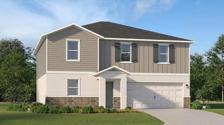 Front exterior of a new home in Wynnstone, Davenport, FL, highlighting curb appeal (Image 1). Front exterior of a new home in Wynnstone, Davenport, FL, highlighting curb appeal (Image 1).