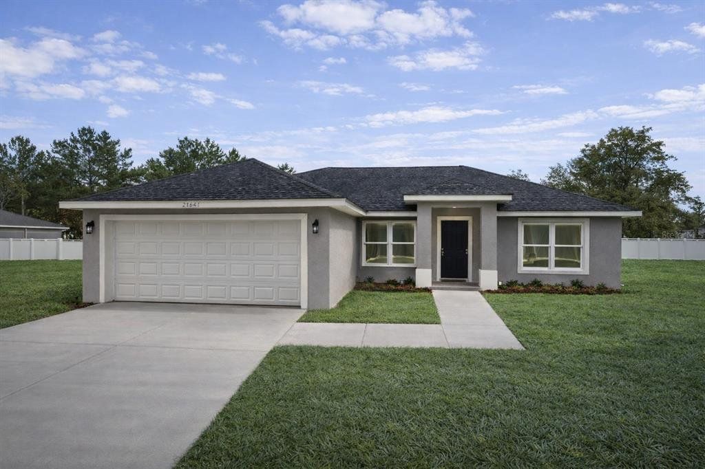 Front exterior of a new home in , Ocala, FL, highlighting curb appeal (Image 1). Front exterior of a new home in , Ocala, FL, highlighting curb appeal (Image 1).