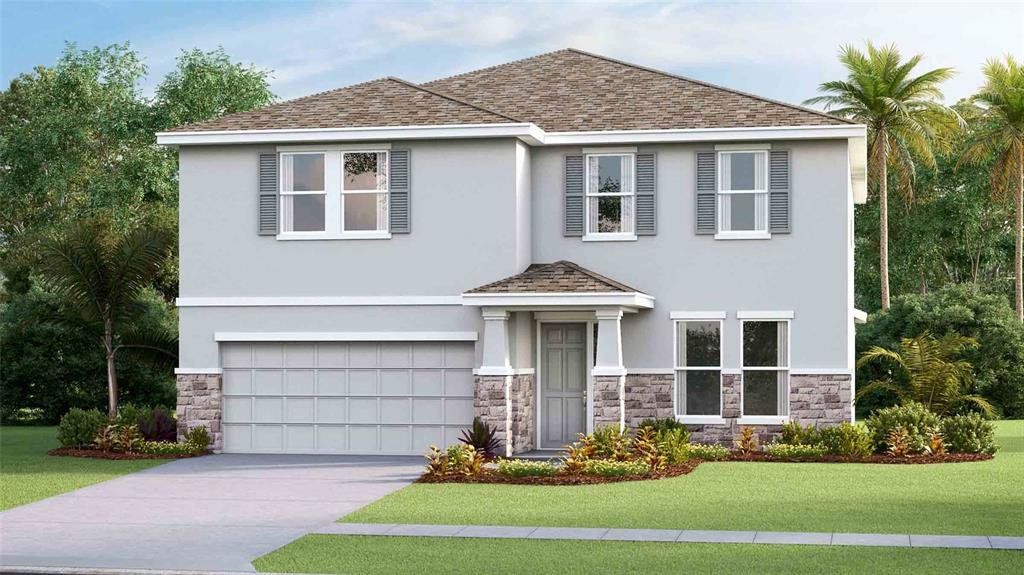 Front exterior of a new home in Northwater at Two Rivers, Zephyrhills, FL, highlighting curb appeal (Image 1). Front exterior of a new home in Northwater at Two Rivers, Zephyrhills, FL, highlighting curb appeal (Image 1).