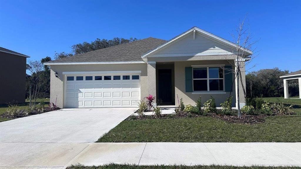 Front exterior of a new home in Timberwalk, Mount Dora, FL, highlighting curb appeal (Image 1). Front exterior of a new home in Timberwalk, Mount Dora, FL, highlighting curb appeal (Image 1).