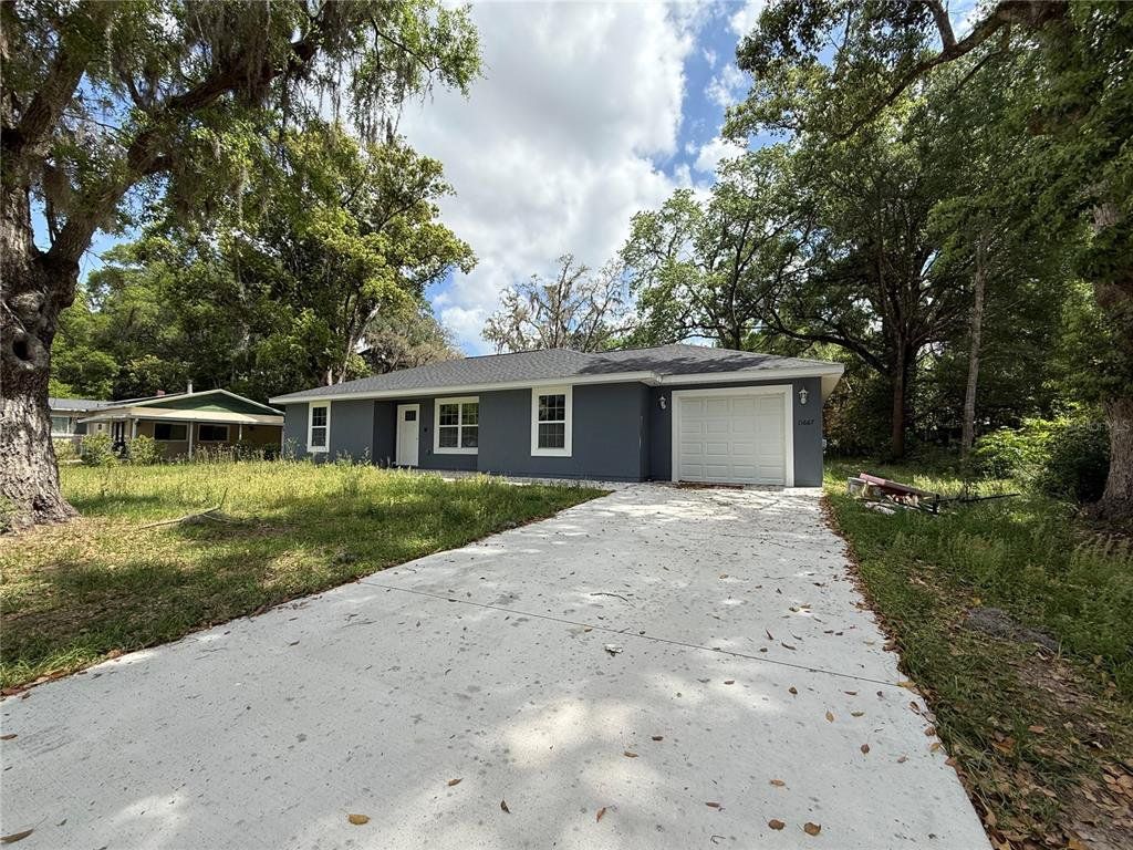 Front exterior of a new home in , Belleview, FL, highlighting curb appeal (Image 1). Front exterior of a new home in , Belleview, FL, highlighting curb appeal (Image 1).