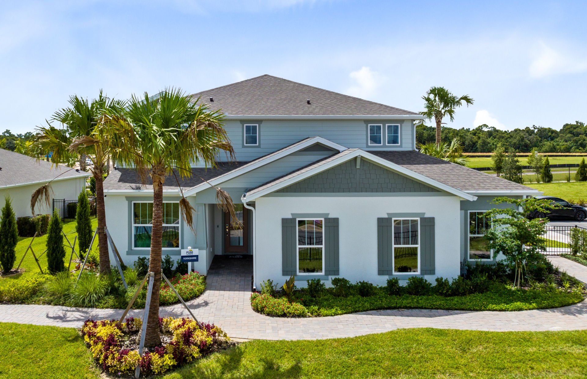Front exterior of a new home in Foothills Preserve, Mount Dora, FL, highlighting curb appeal (Image 1). Front exterior of a new home in Foothills Preserve, Mount Dora, FL, highlighting curb appeal (Image 1).