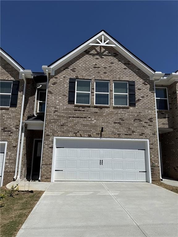 Front exterior of a new home in Parkway James, Snellville, GA, highlighting curb appeal (Image 1). Front exterior of a new home in Parkway James, Snellville, GA, highlighting curb appeal (Image 1).