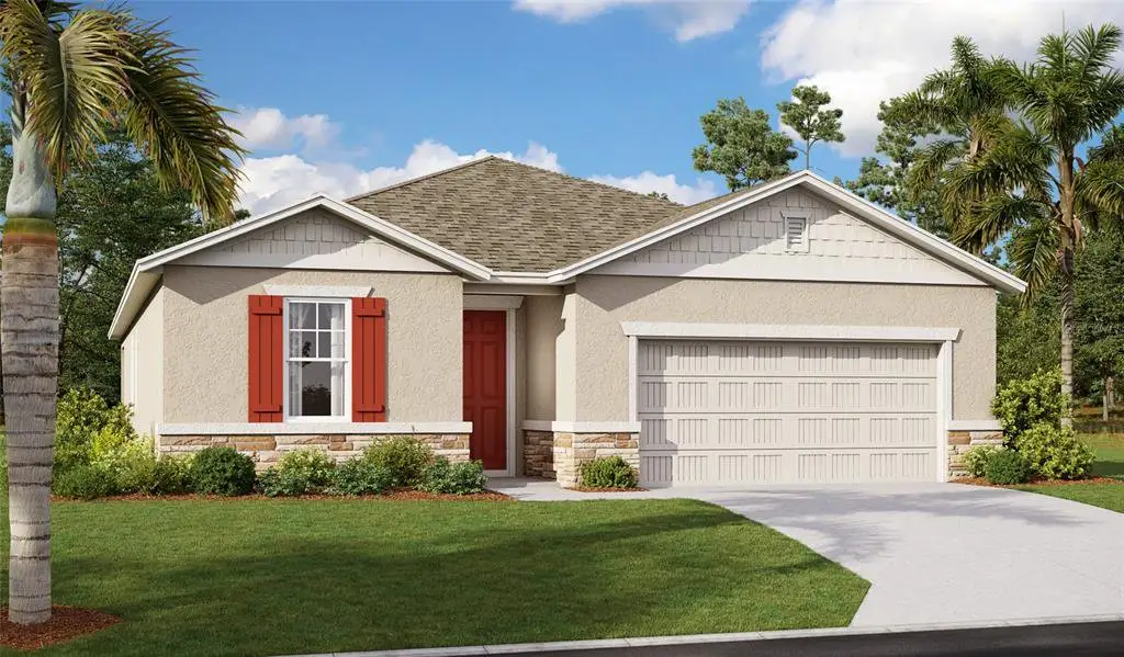 Front exterior of a new home in Seasons at Sutton Preserve, Eagle Lake, FL, highlighting curb appeal (Image 1).